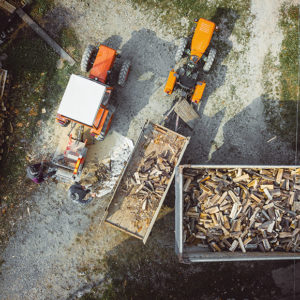 Birds-eye view of forestry waste in skips to promote Greenfield Risk Solutions Insurance Brokers - Waste and Recycling Risks Insurance