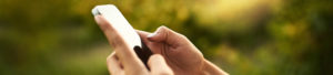 Person holding phone to promote Greenfield Risk Solutions - Claims