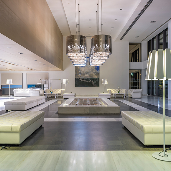 Empty modern hotel lobby to promote Greenfield Risk Solutions Insurance Brokers - Leisure, Hospitality and Accommodation Insurance