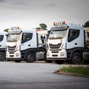 Lined up parked HGVs to promote Greenfield Risk Solutions Insurance Brokers - Motor Fleet Insurance - Haulage Fleet