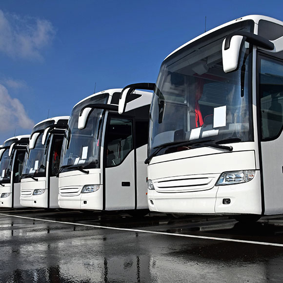 Parked fleet of buses to promote Greenfield Risk Solutions Insurance Brokers - Motor Fleet Insurance - Coach and Bus