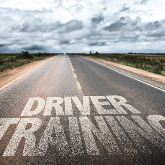 Driver Training written in white paint on the road to promote Greenfield Risk Solutions Insurance Brokers - Driver Training Insurance