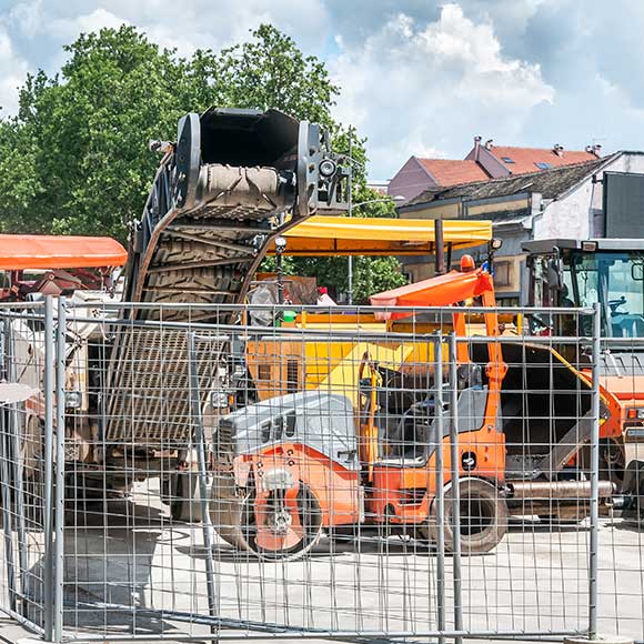 Fenced off construction equipment to promote Greenfield Risk Solutions Insurance Brokers - Contractors Insurance